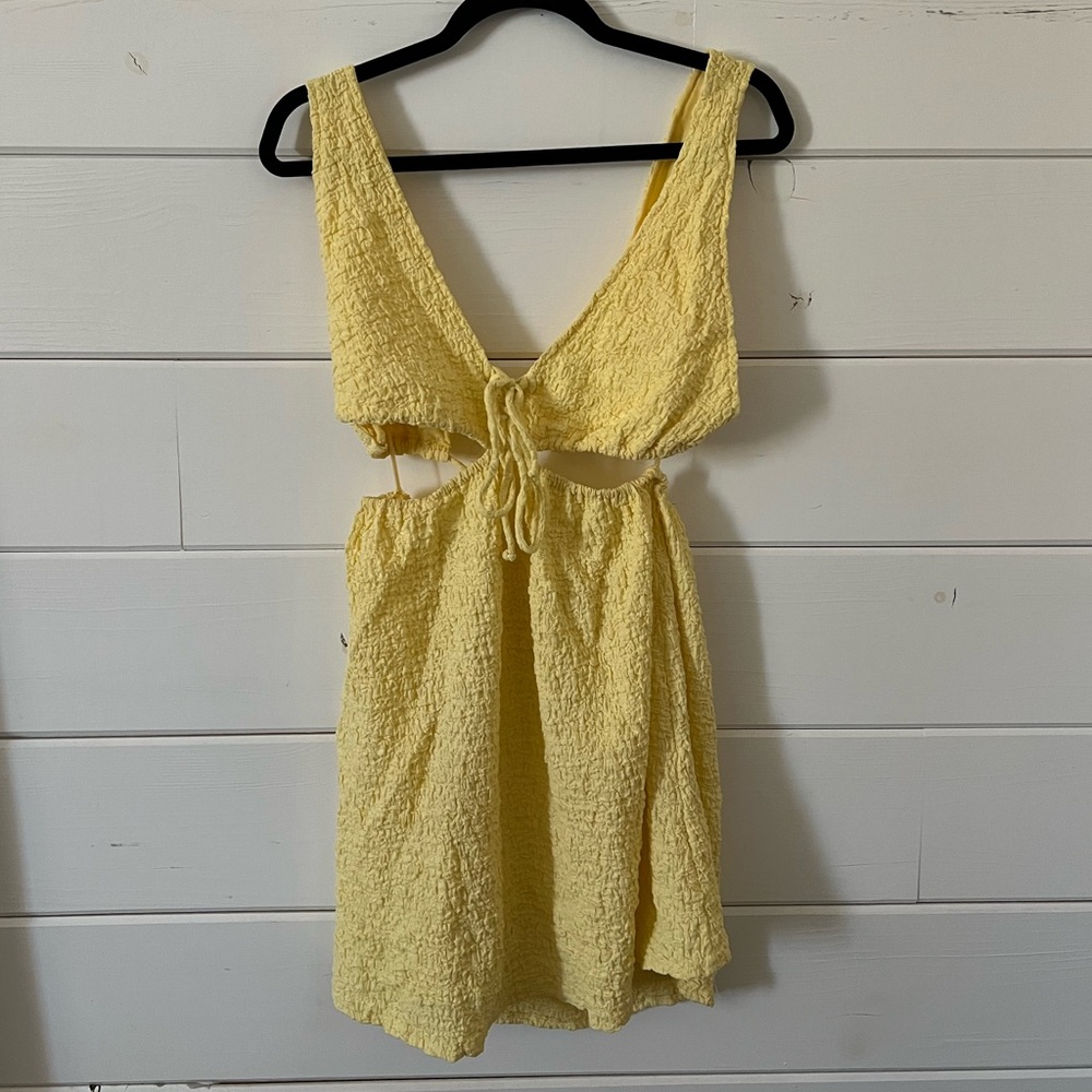 Yellow dress with cutouts